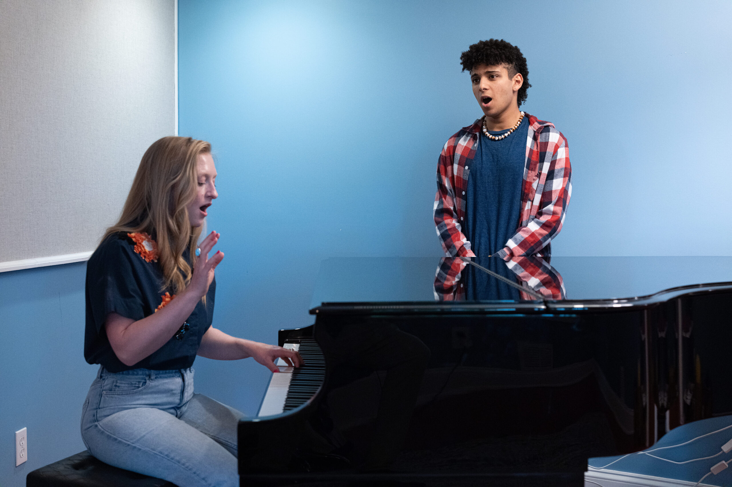 Sarah Hawkey Sarah Hawkey teaches a private voice student in her voice studio in Fairfield County, CT